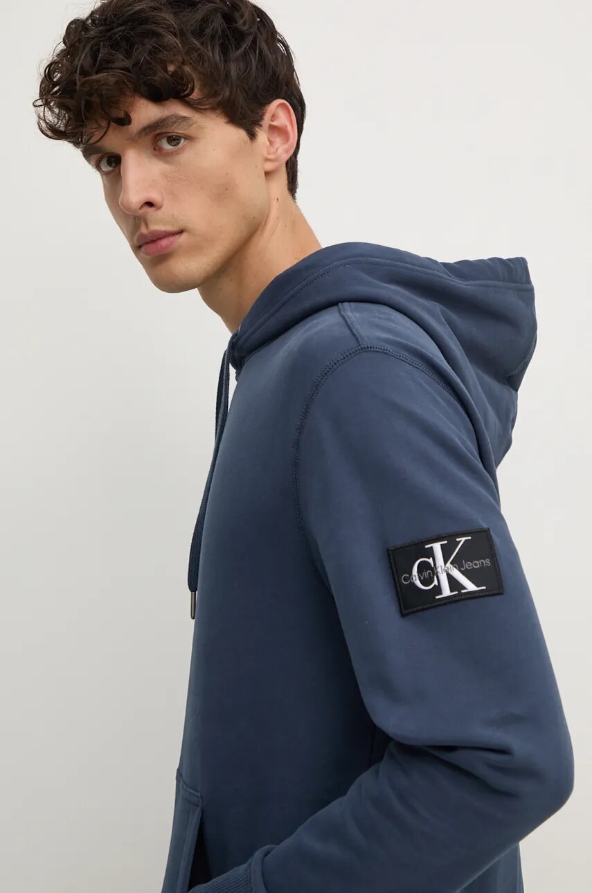 Бавовняна кофта Calvin Klein Jeans чоловіча колір синій з капюшоном з аплікацією J30J323430