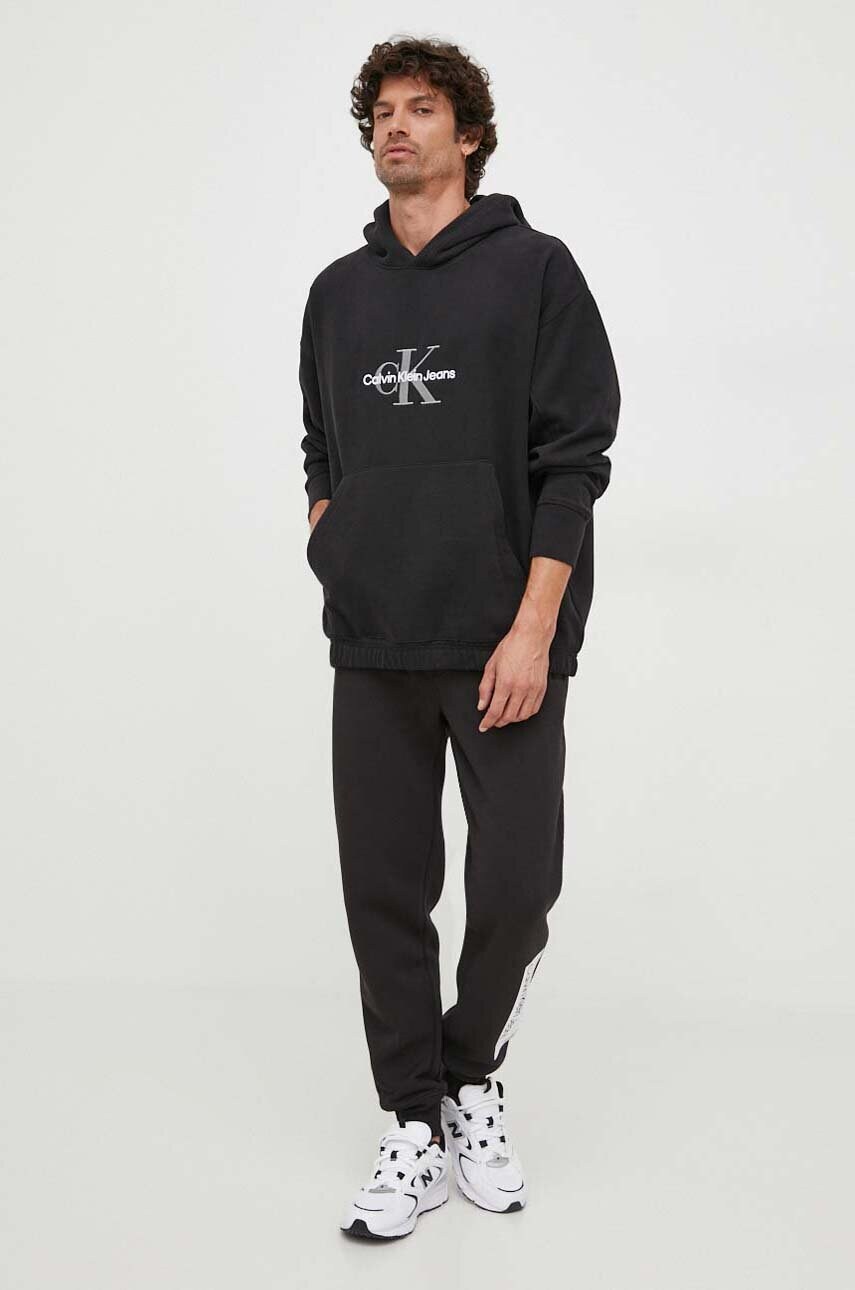 Кофта Calvin Klein Jeans чоловіча колір чорний з капюшоном з аплікацією