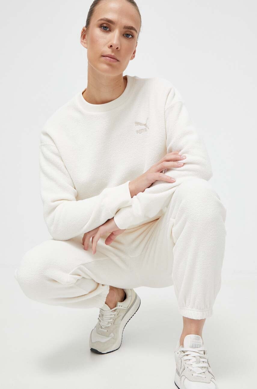 Спортивні штани Puma колір бежевий однотонні