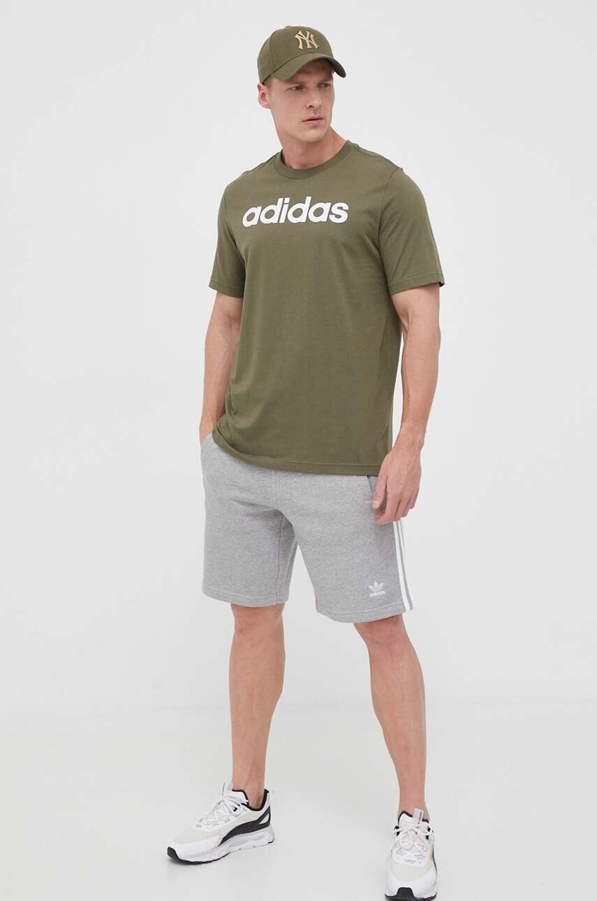 Бавовняна футболка adidas колір зелений з принтом
