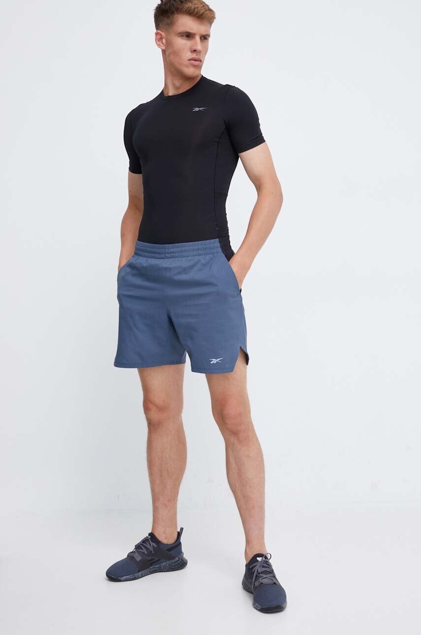 Тренувальна футболка Reebok Compression колір чорний однотонна