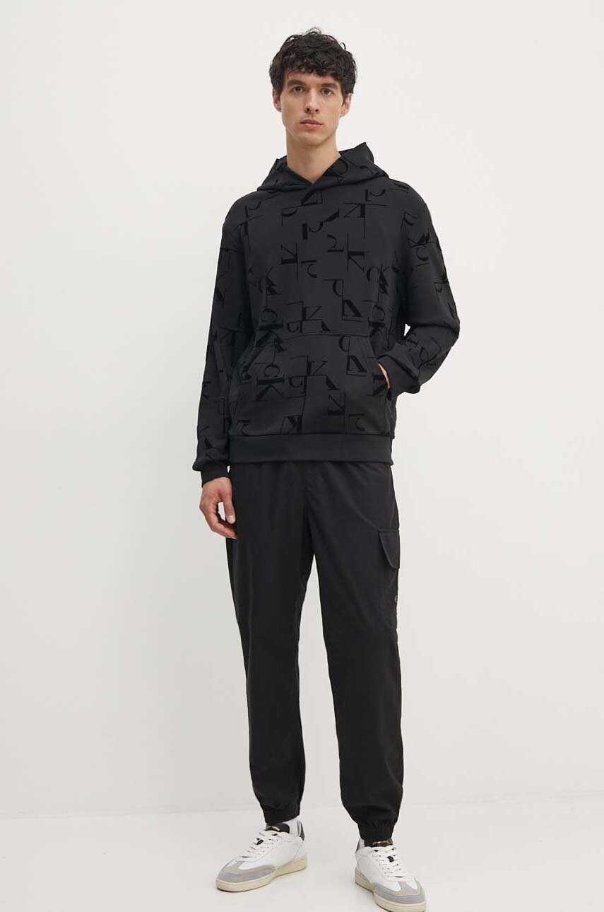 Бавовняна кофта Calvin Klein Jeans чоловіча колір чорний з капюшоном візерунок J30J325642