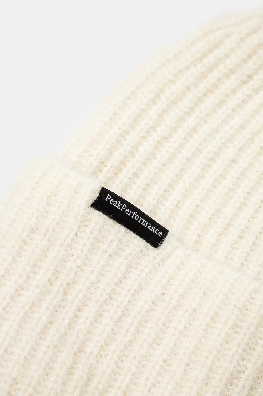 Вовняна шапка Peak Performance Woolblend Hat колір бежевий з тонкого трикотажу вовна G80628