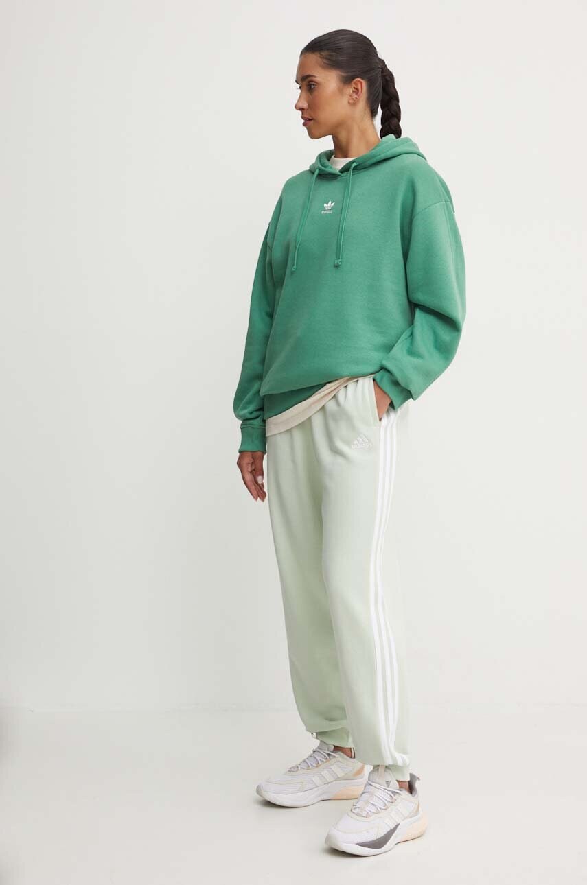 Бавовняні спортивні штани adidas Essentials колір зелений візерунок IY4236