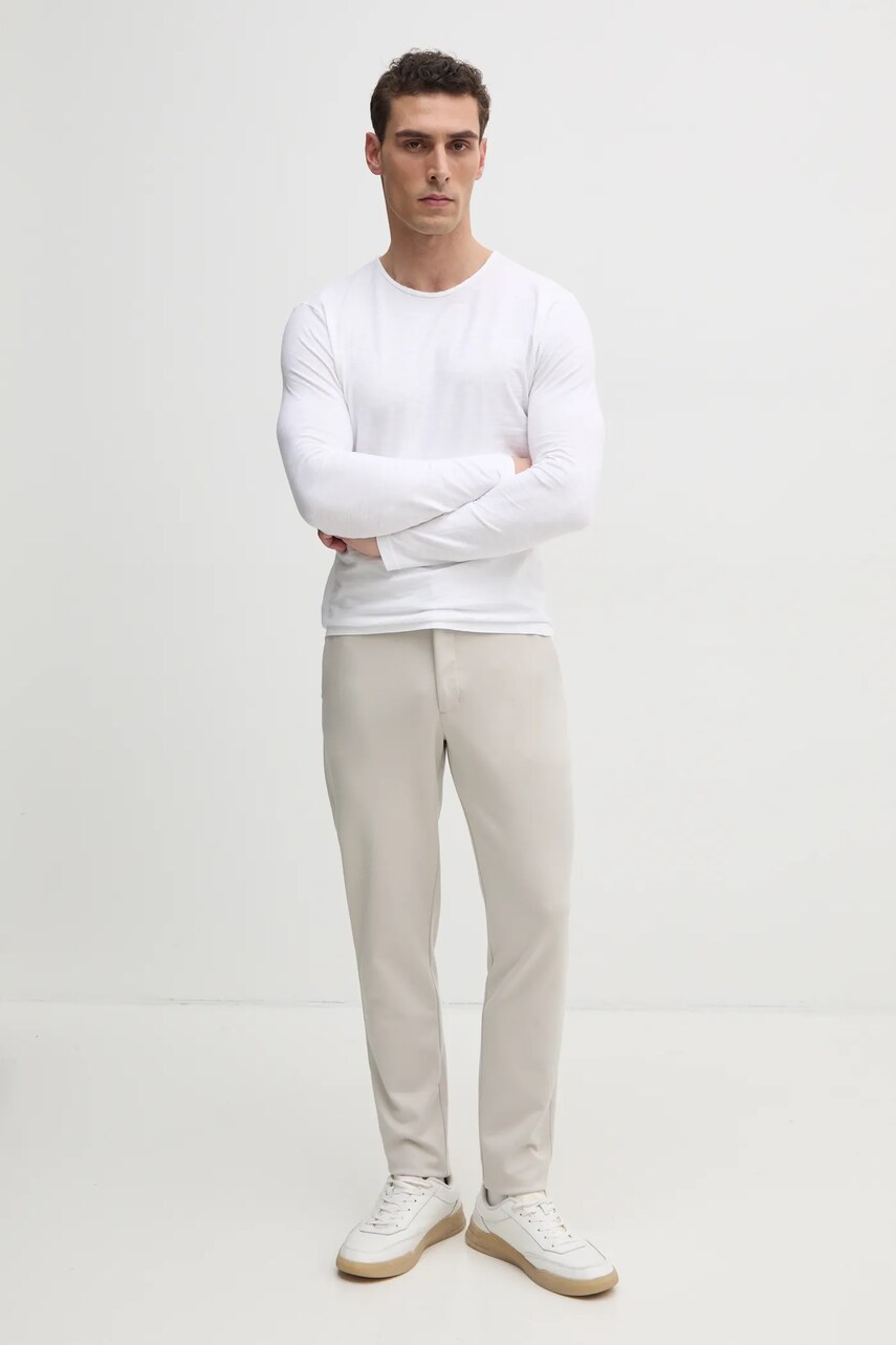 Штани Calvin Klein чоловічі колір бежевий облягаючі K10K113647