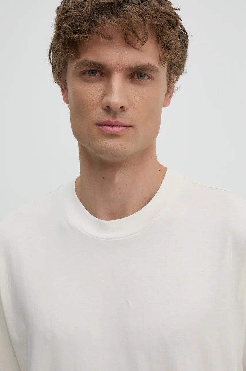 Бавовняна футболка Calvin Klein Jeans чоловіча колір бежевий однотонна J30J326857