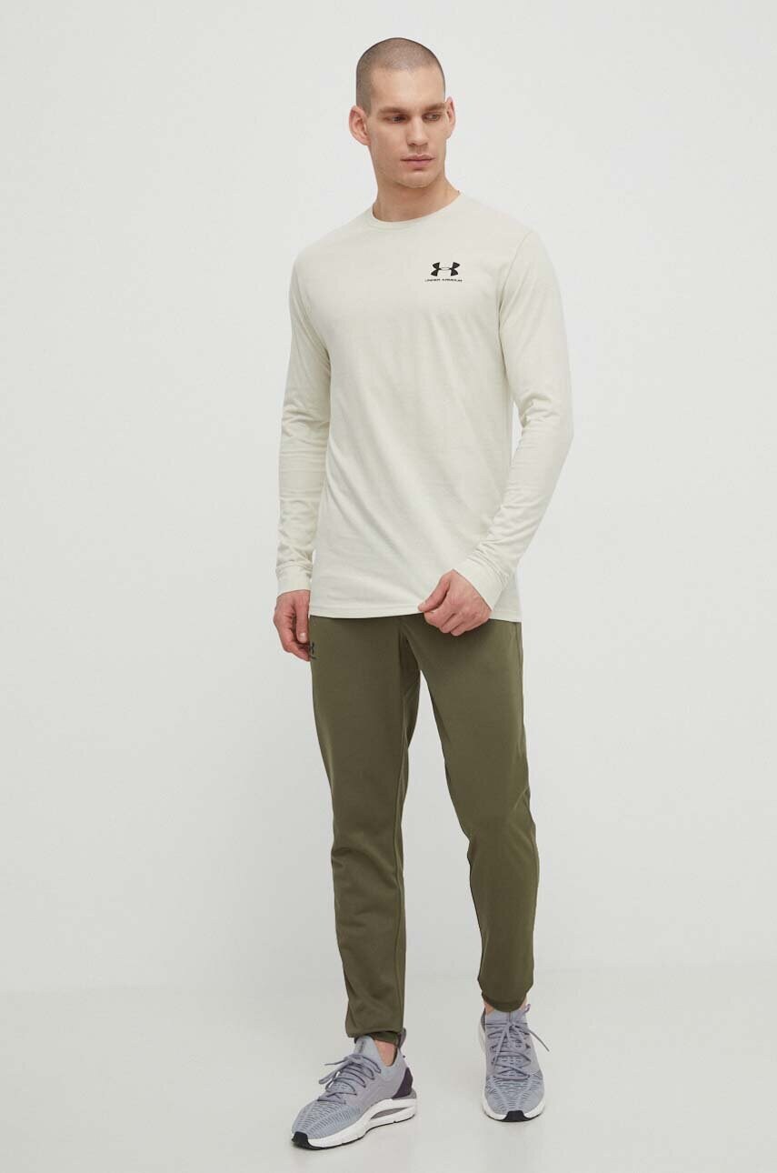 Спортивні штани Under Armour колір зелений однотонні