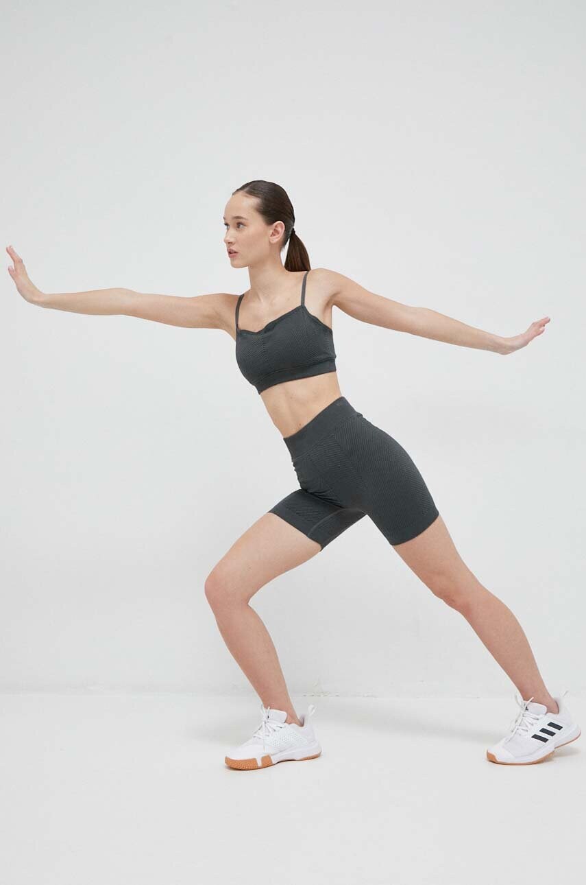 Спортивний бюстгальтер Calvin Klein Performance Essentials колір зелений однотонний