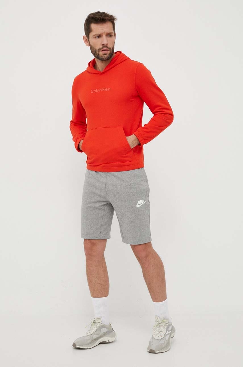 Кофта Calvin Klein Performance Essentials колір помаранчевий з капюшоном однотонна