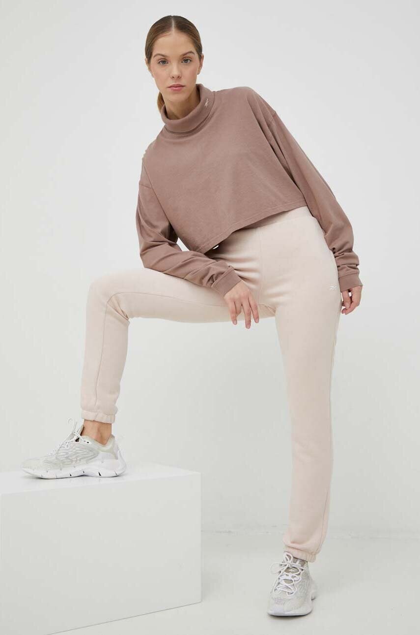Спортивні штани Reebok колір рожевий однотонні