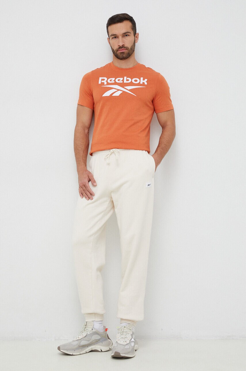 Бавовняні спортивні штани Reebok Classic колір бежевий однотонні HS9153-NONDYE