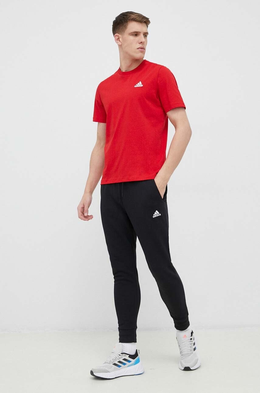 Бавовняні спортивні штани adidas колір чорний однотонні