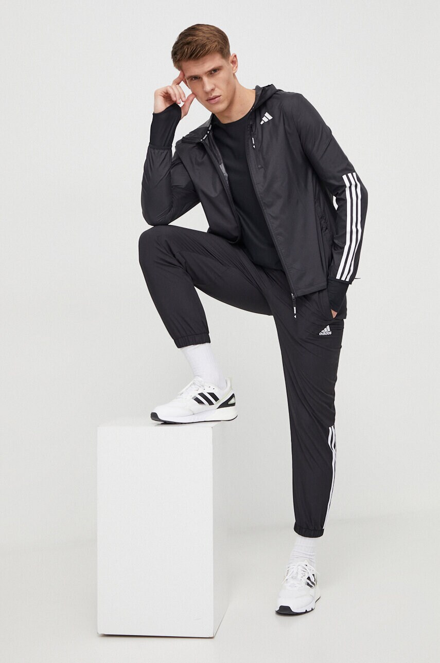 Лонгслів до бігу adidas Performance Own the Run колір чорний з принтом