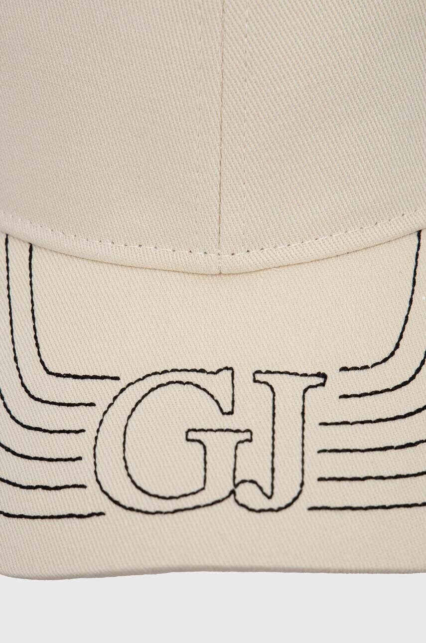 Бавовняна бейсболка Guess колір бежевий з аплікацією