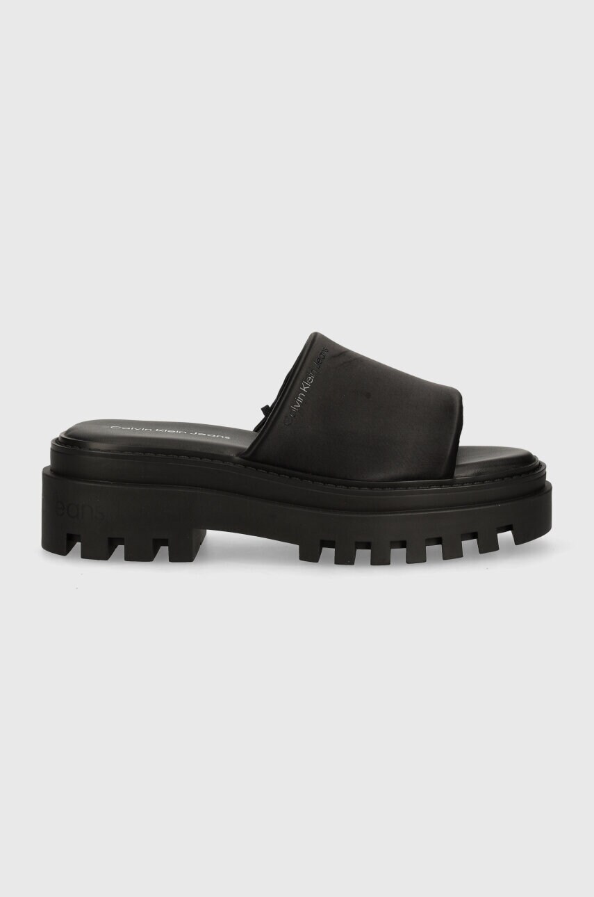 Шльопанці Calvin Klein Jeans TOOTHY COMBAT SANDAL IN DC жіночі колір чорний на платформі YW0YW01339