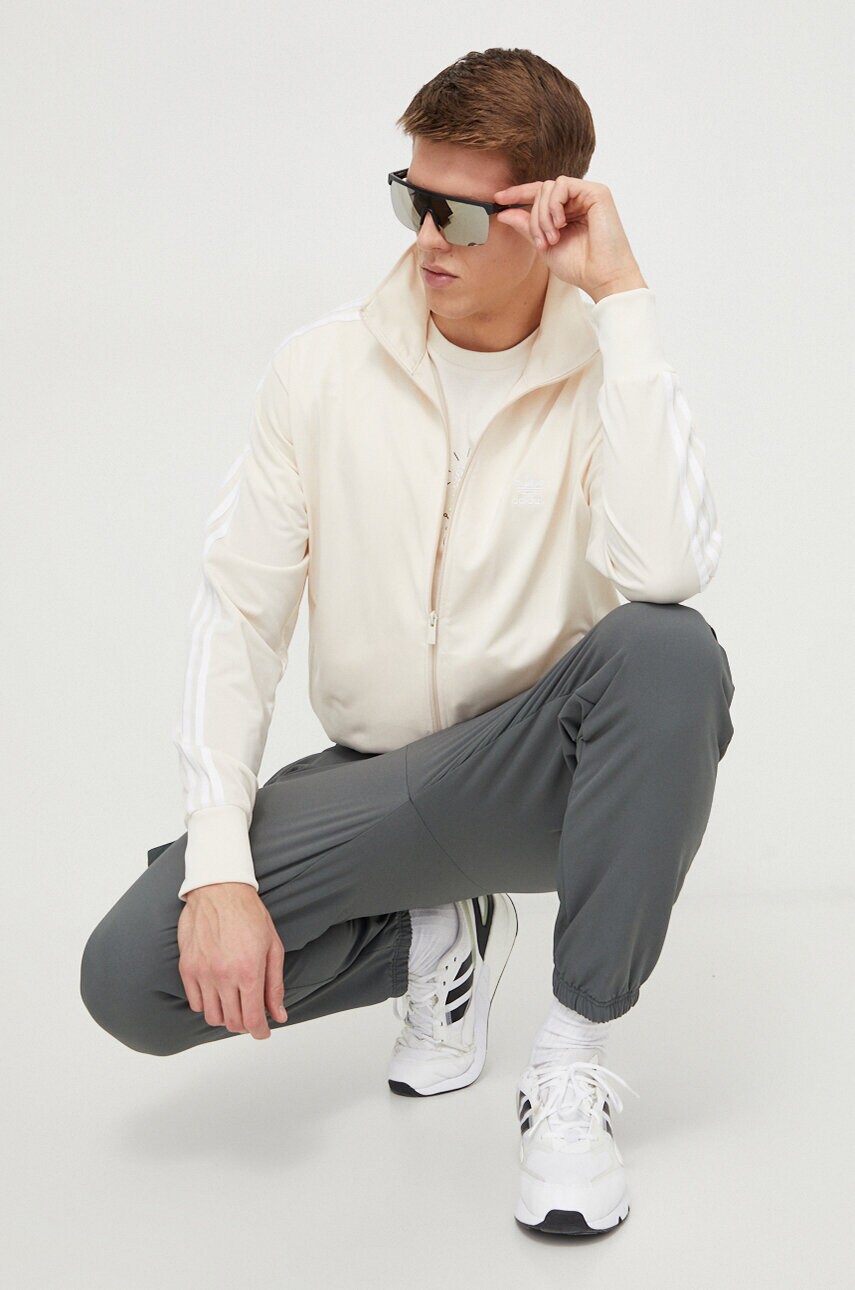 Спортивні штани adidas колір зелений однотонні