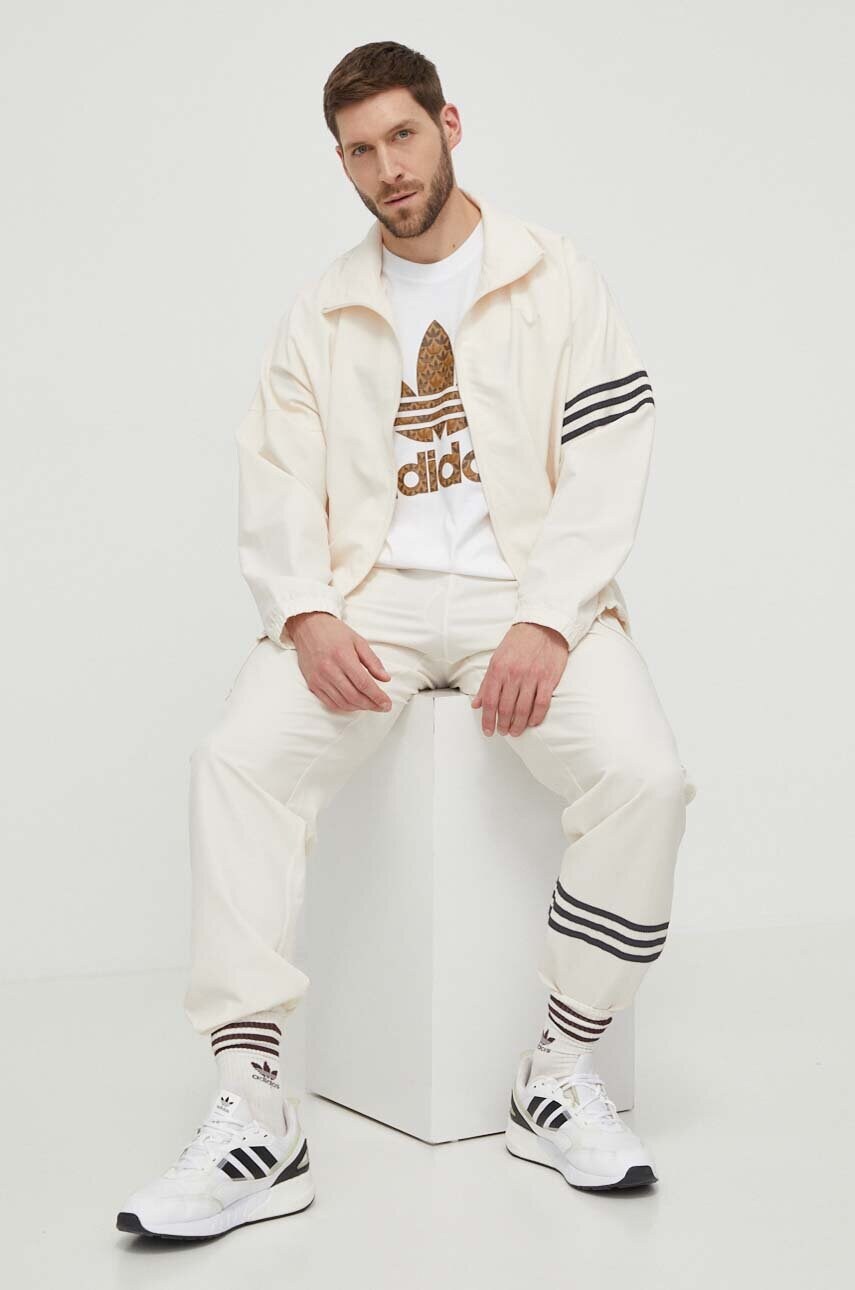 Спортивні штани adidas Originals колір бежевий з аплікацією