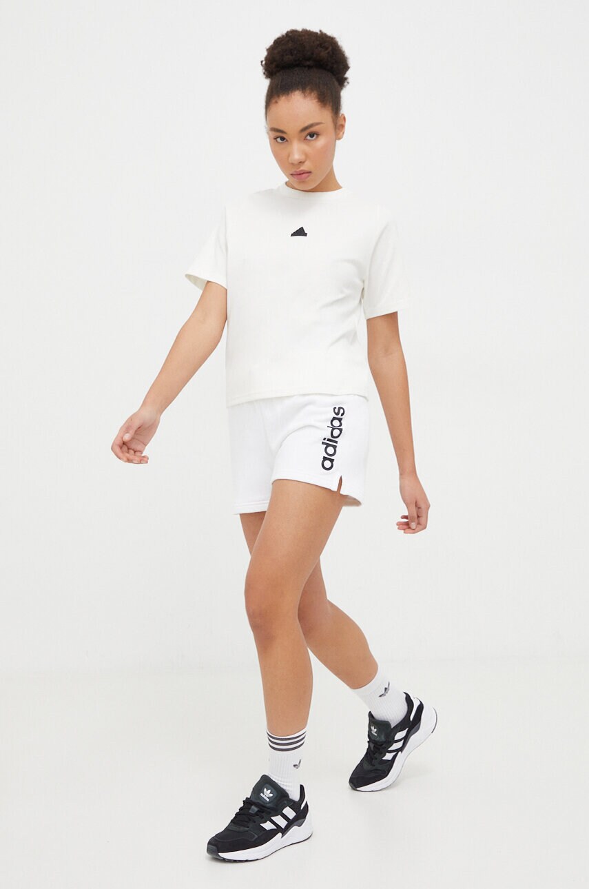Футболка adidas ZNE жіноча колір бежевий IS3920
