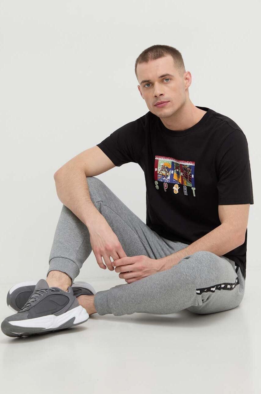 Бавовняна футболка Puma чоловічий колір чорний з принтом