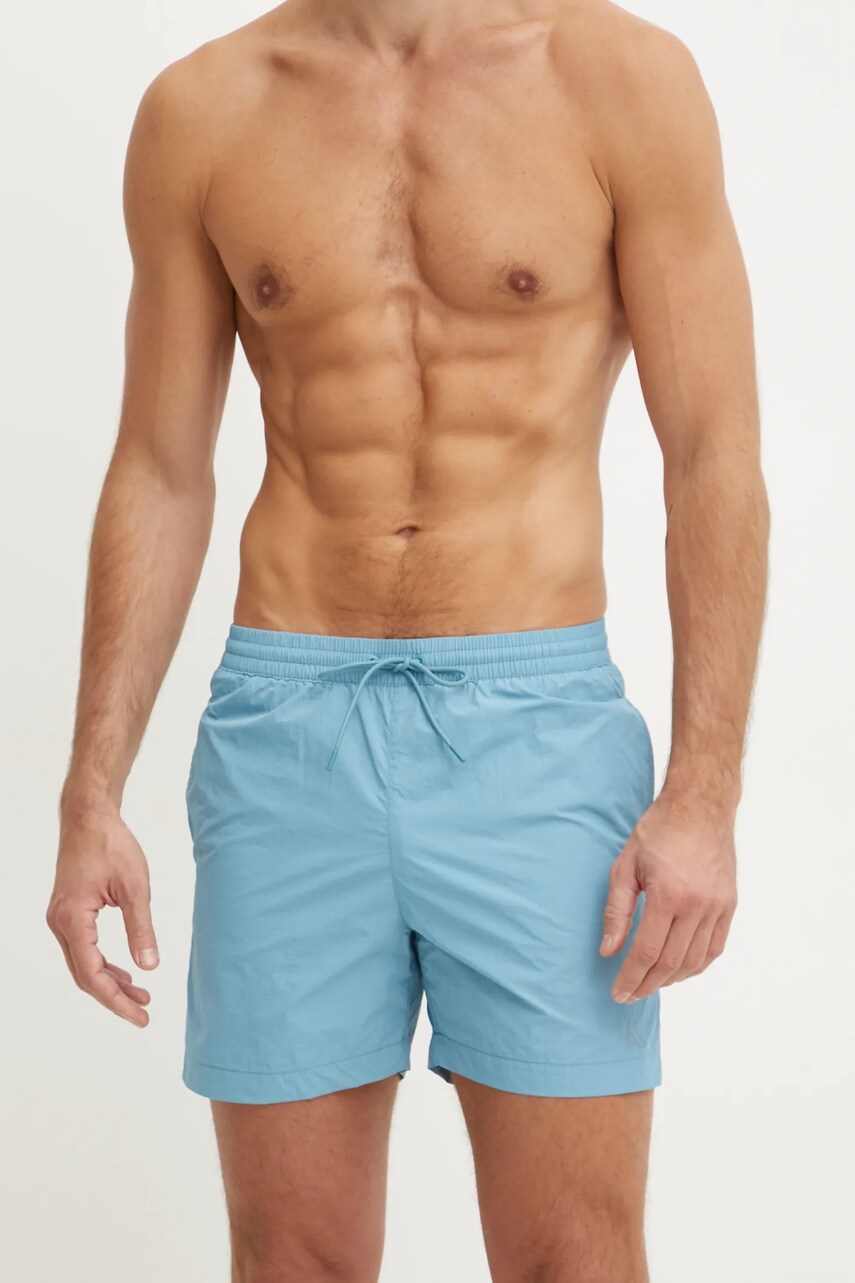 Купальні шорти Calvin Klein колір бірюзовий KM0KM01080