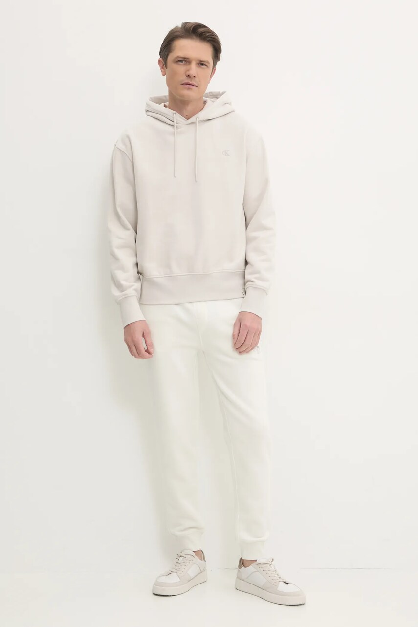 Бавовняна кофта Calvin Klein Jeans чоловіча колір бежевий з капюшоном однотонна J30J326748