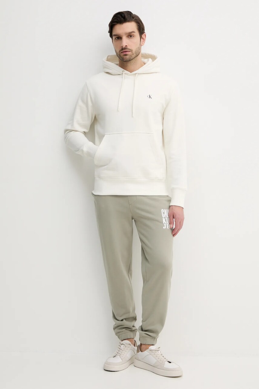 Бавовняна кофта Calvin Klein Jeans чоловіча колір бежевий з капюшоном з принтом J30J327526
