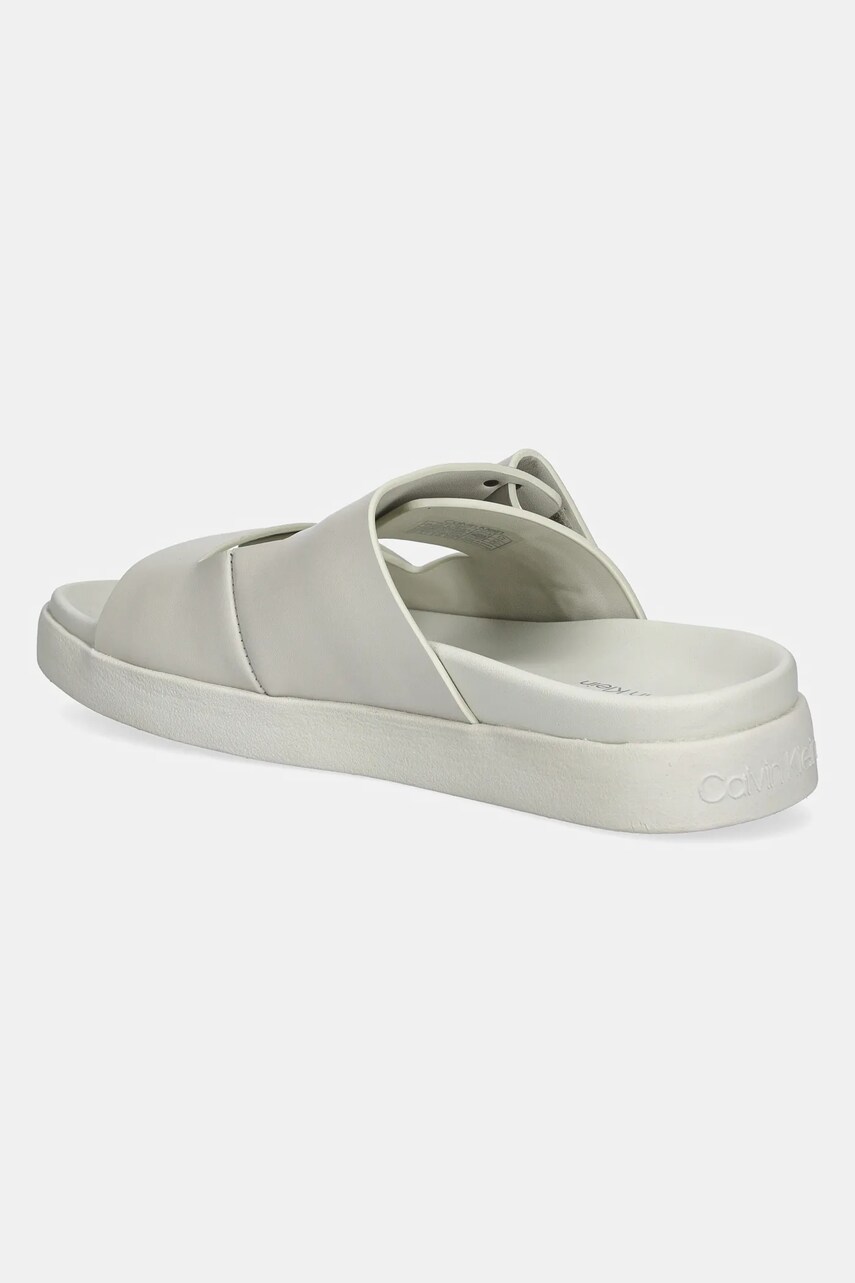Шкіряні шльопанці Calvin Klein FLAT ADJ SLIDE EYELET жіночі колір бежевий HW0HW02489
