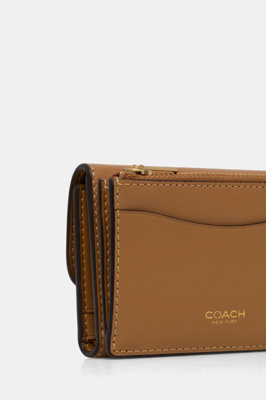 Шкіряний гаманець Coach жіночий колір бежевий CZ111
