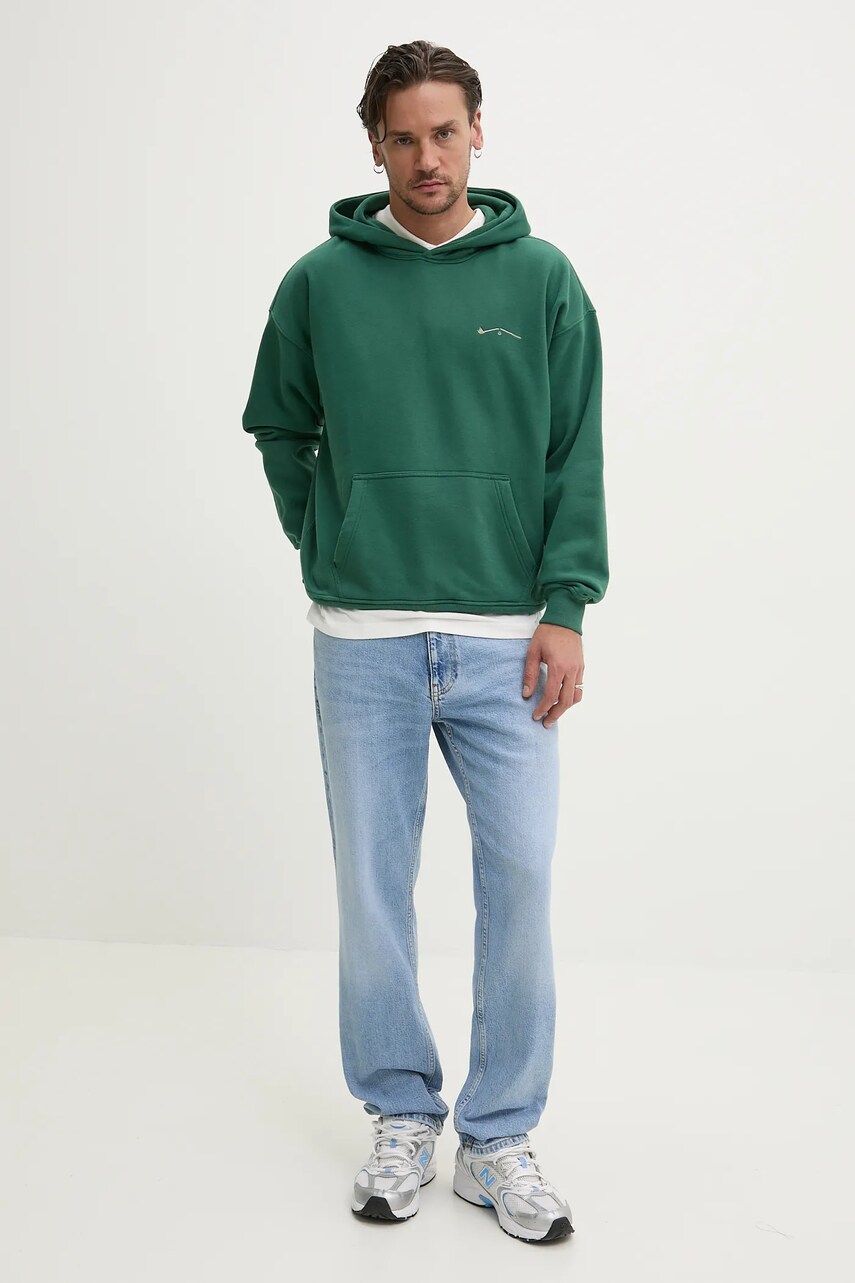 Бавовняне поло Tommy Jeans чоловіче колір бежевий однотонне DM0DM20676