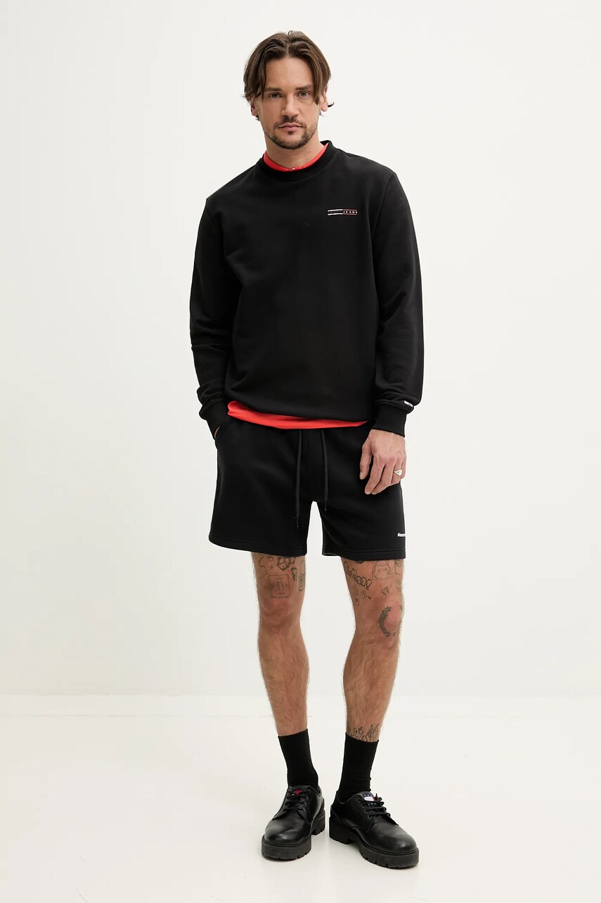 Бавовняне поло Tommy Jeans чоловіче колір помаранчевий однотонне DM0DM20676