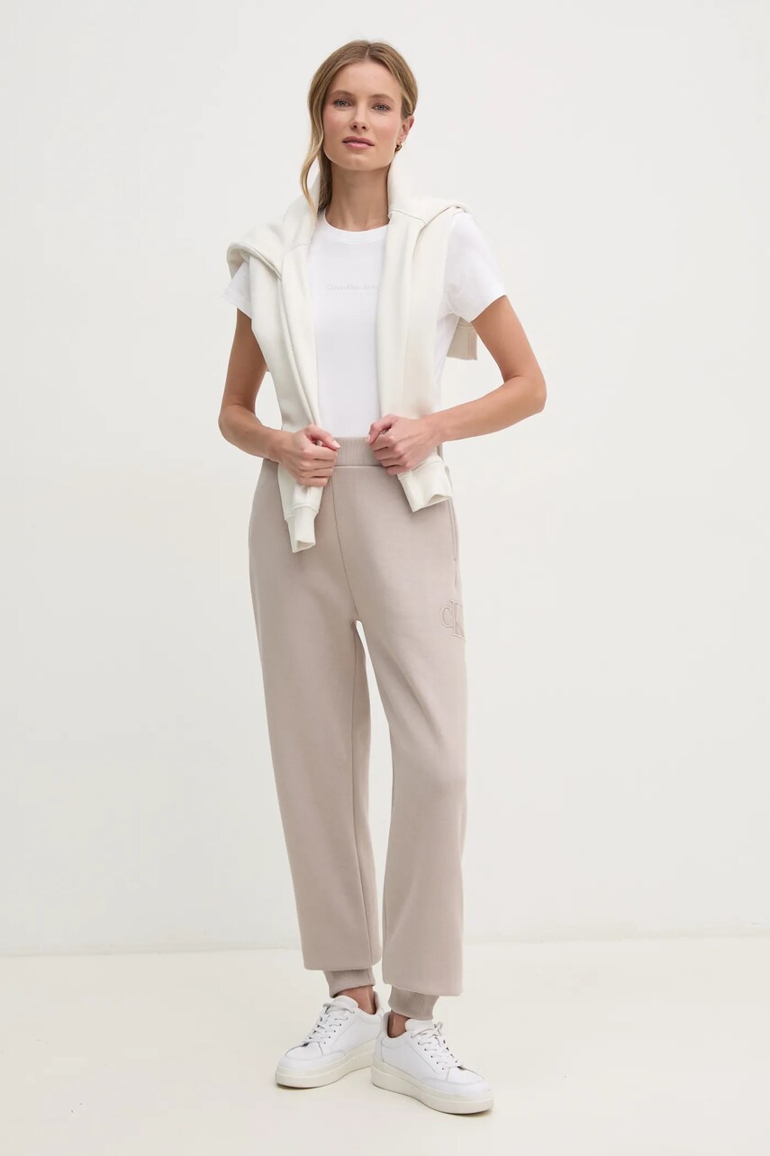 Спортивні штани Calvin Klein Jeans колір бежевий однотонні J20J224841