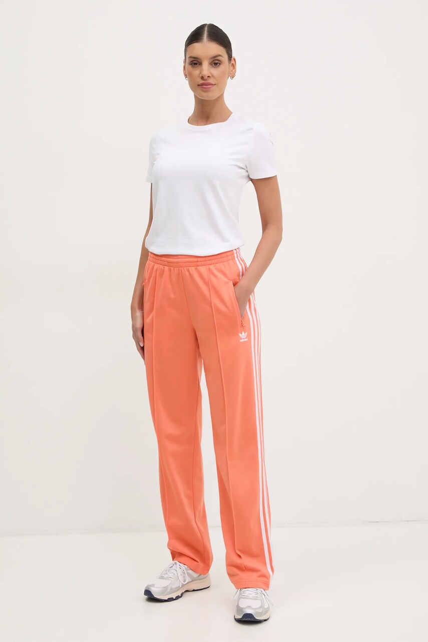 Спортивні штани adidas Originals Firebird жіночі колір помаранчевий з аплікацією JC8286