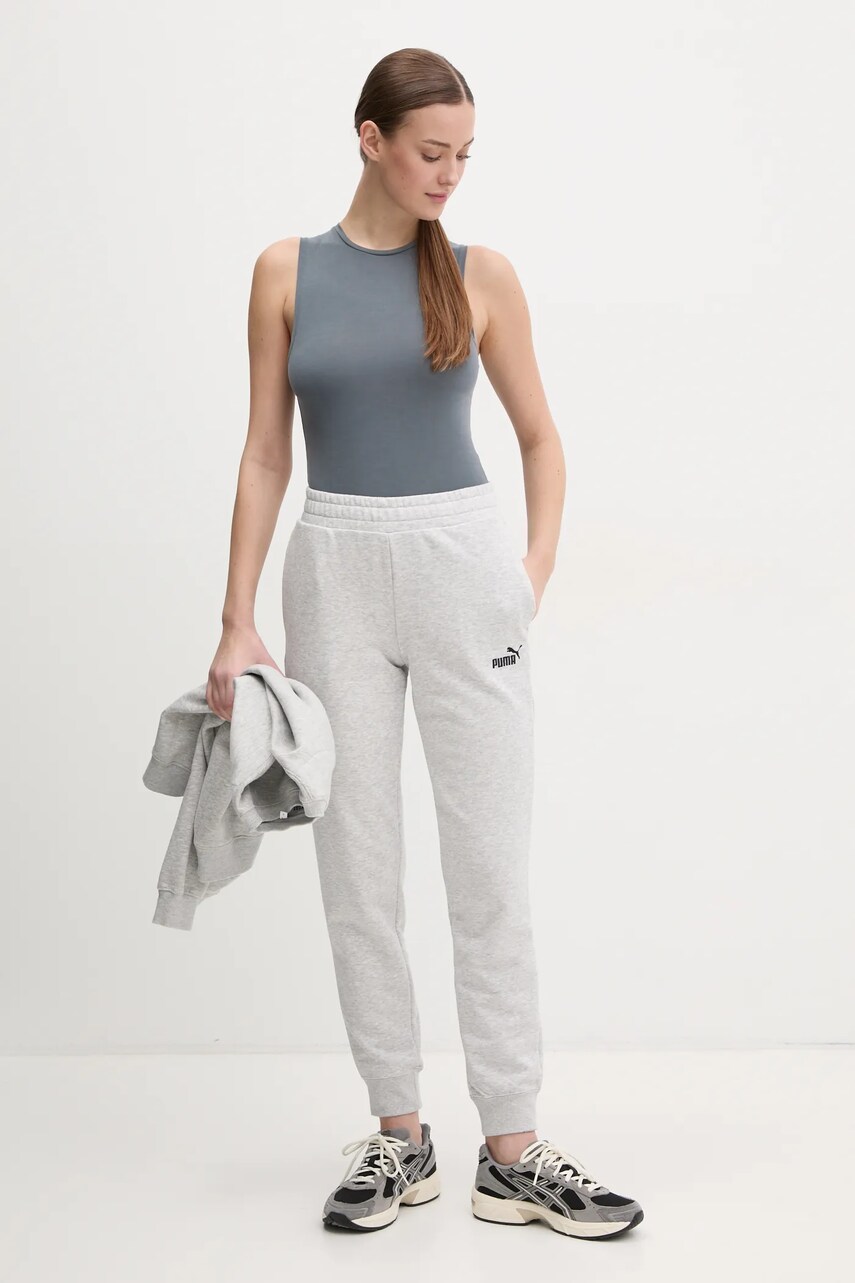 Спортивні штани Puma жіночі колір сірий з аплікацією 682450