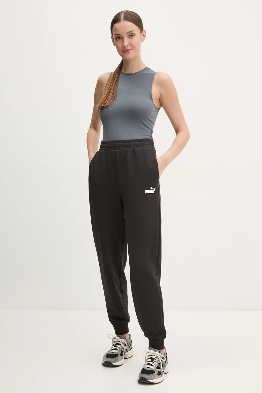 Спортивні штани Puma жіночі колір чорний однотонні 682458