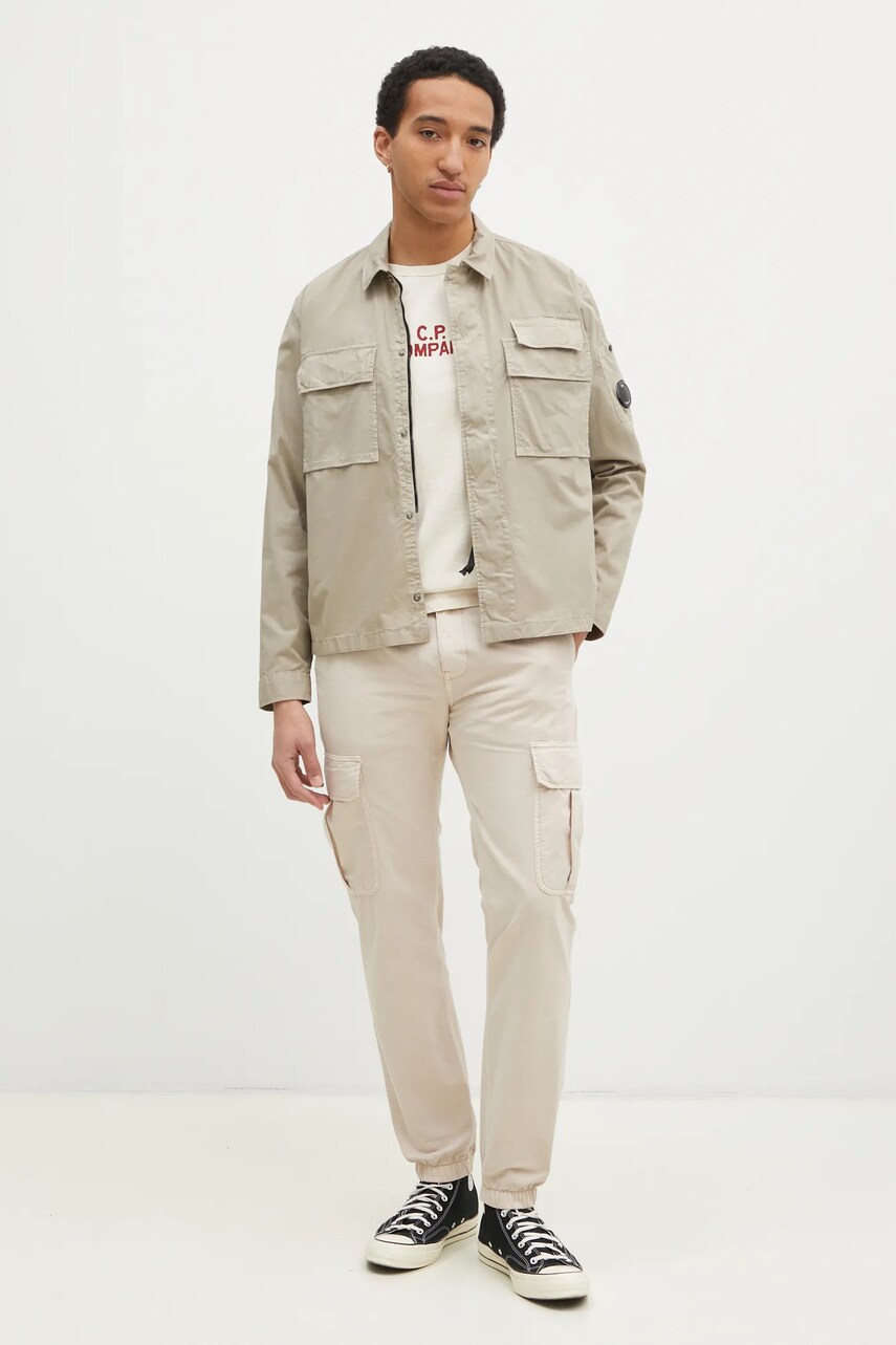 Бавовняні штани Tommy Jeans колір бежевий фасон cargo DM0DM20284