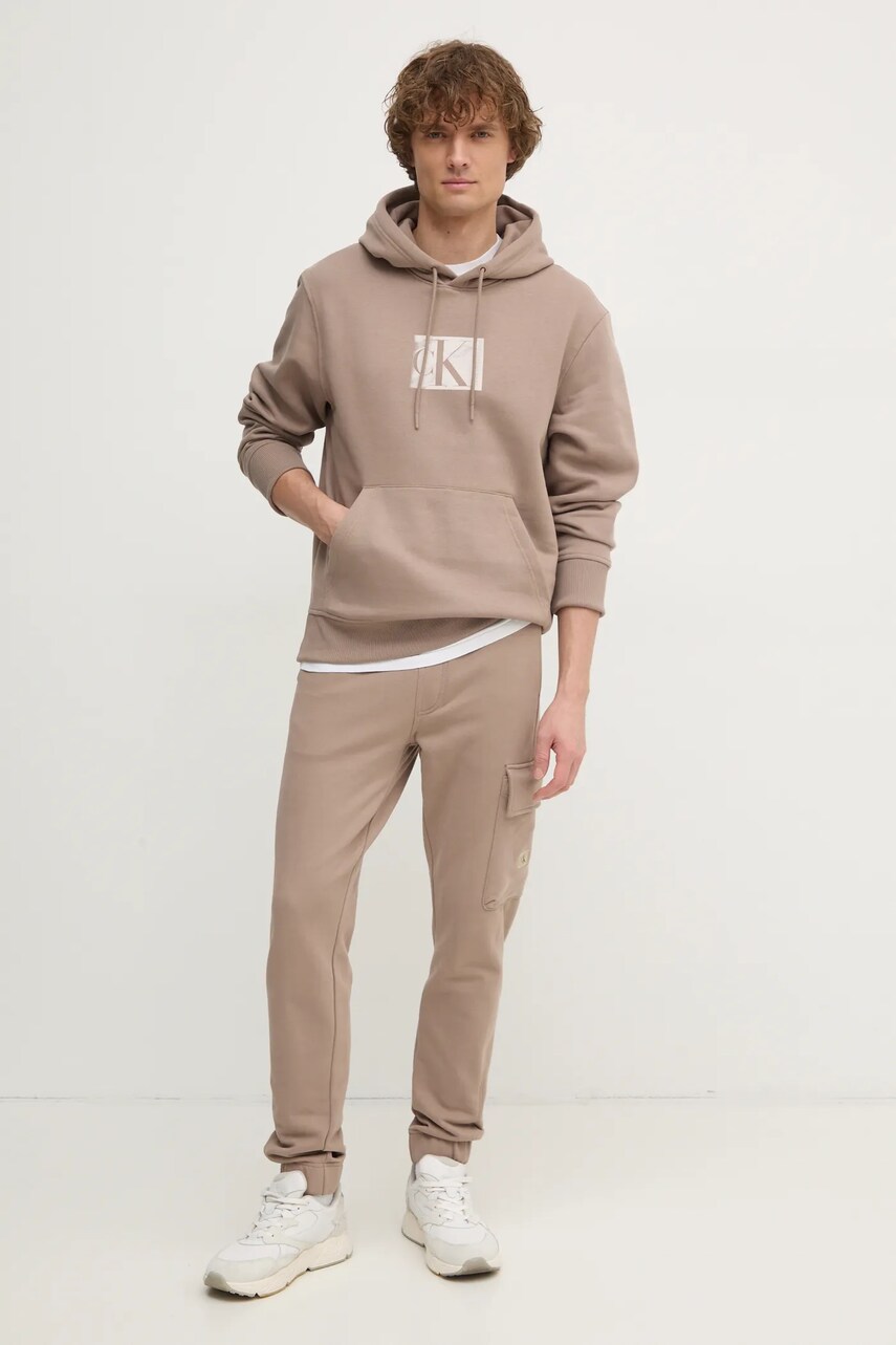 Бавовняні спортивні штани Calvin Klein Jeans колір бежевий однотонні J30J326762