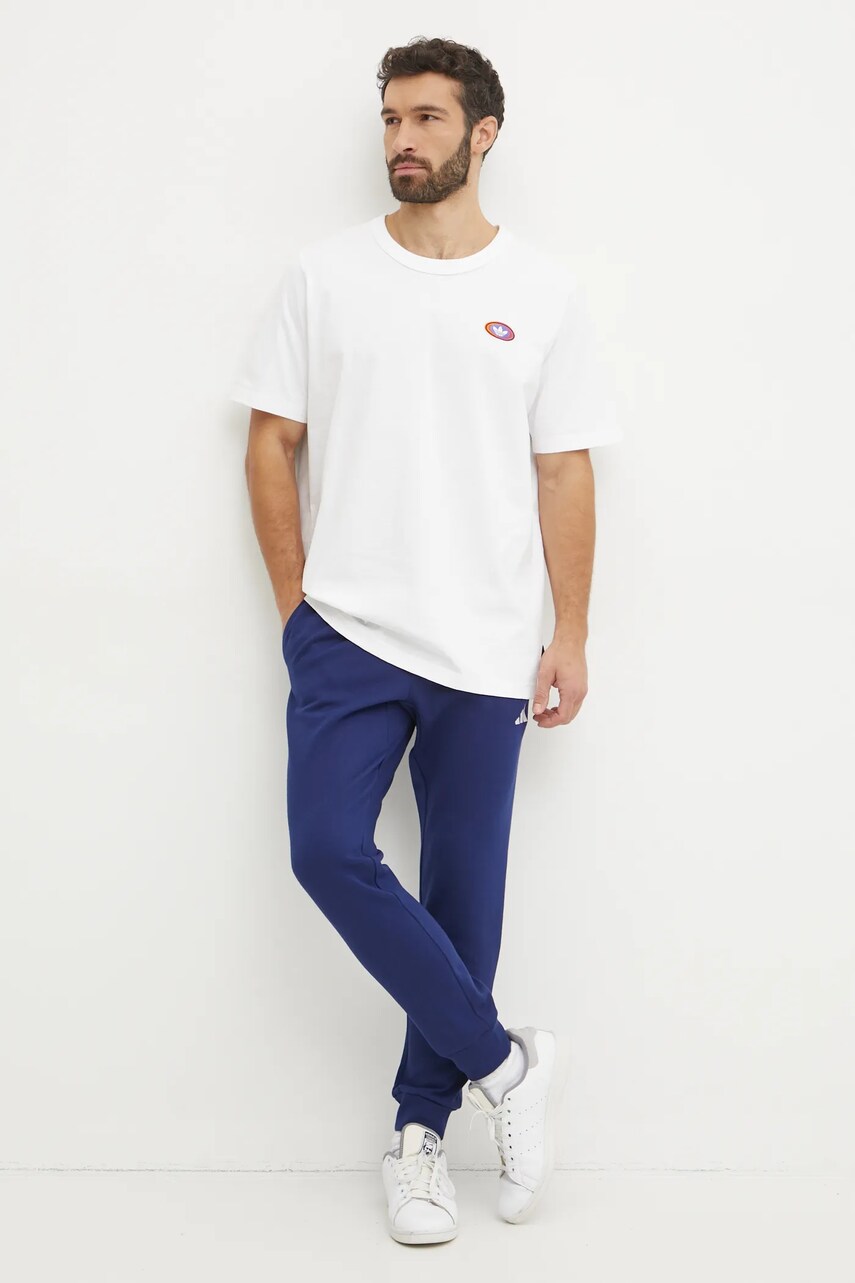 Спортивні штани adidas Feelcozy колір синій однотонні JE3814