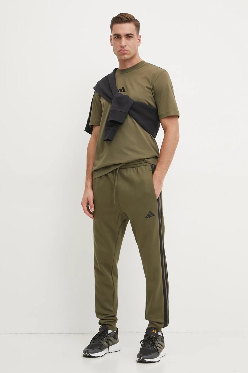 Бавовняна футболка adidas Essential чоловіча колір зелений однотонна JF1097